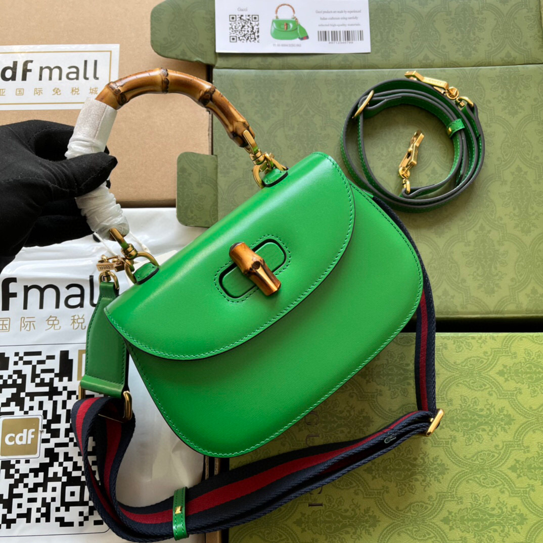 G*u*i bamboo handle bag