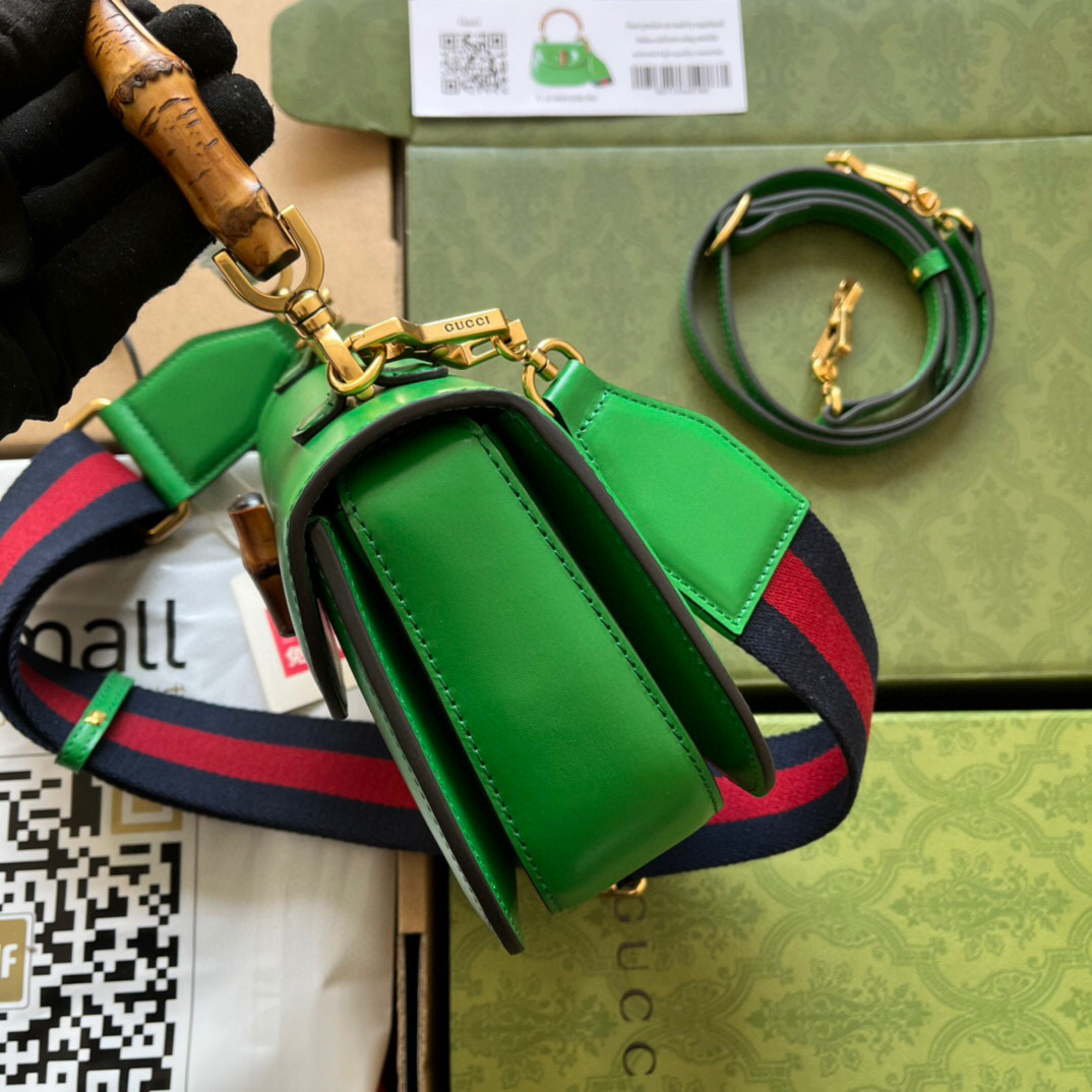 G*u*i bamboo handle bag