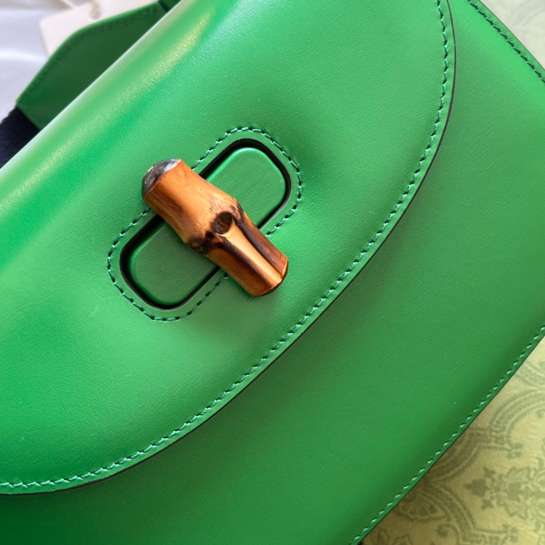 G*u*i bamboo handle bag