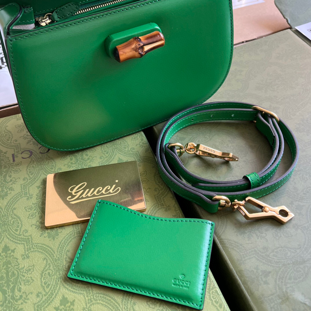 G*u*i bamboo handle bag
