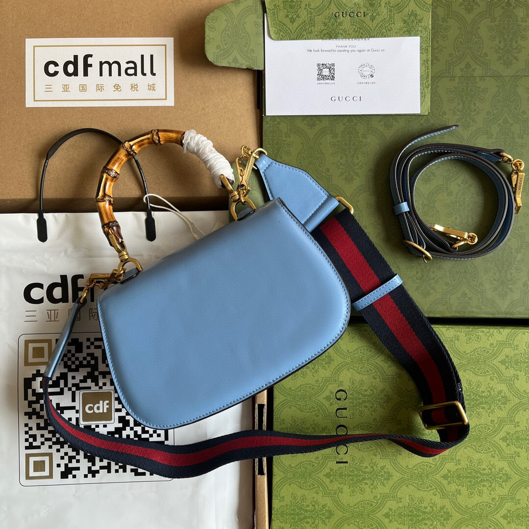 G*u*i bamboo handle bag