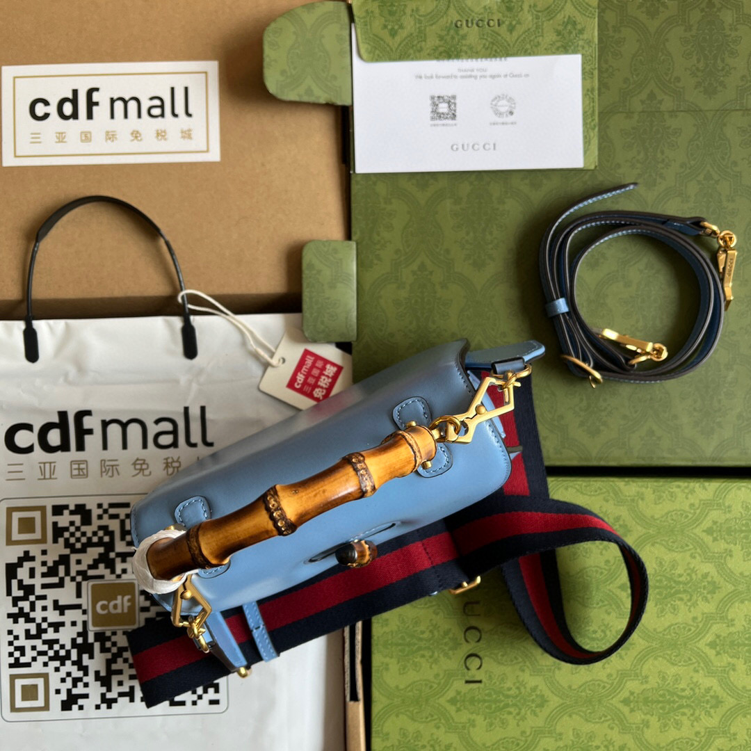 G*u*i bamboo handle bag