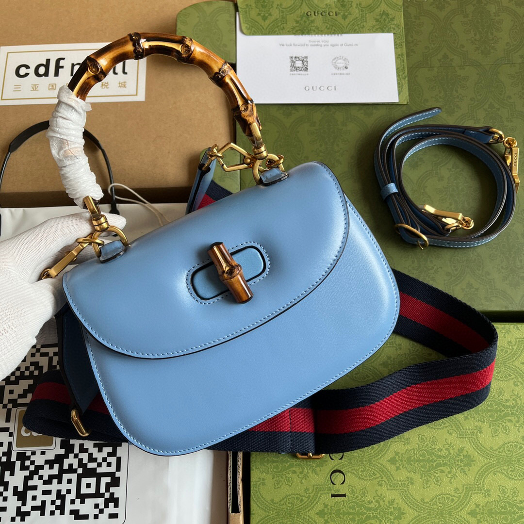 G*u*i bamboo handle bag