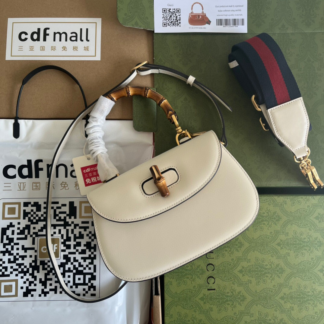 G*u*i bamboo handle bag