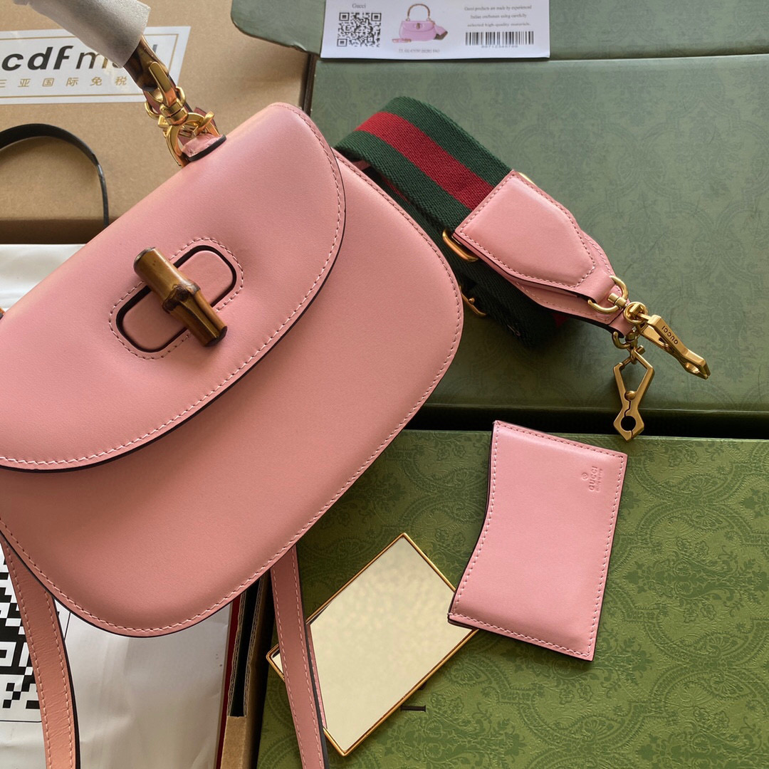 G*u*i bamboo handle bag