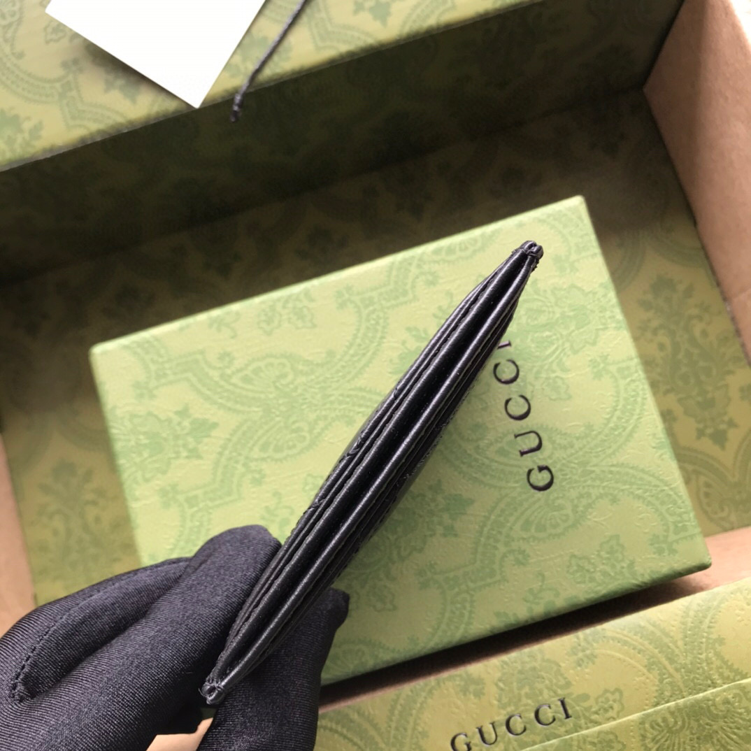 G*u*i card holder