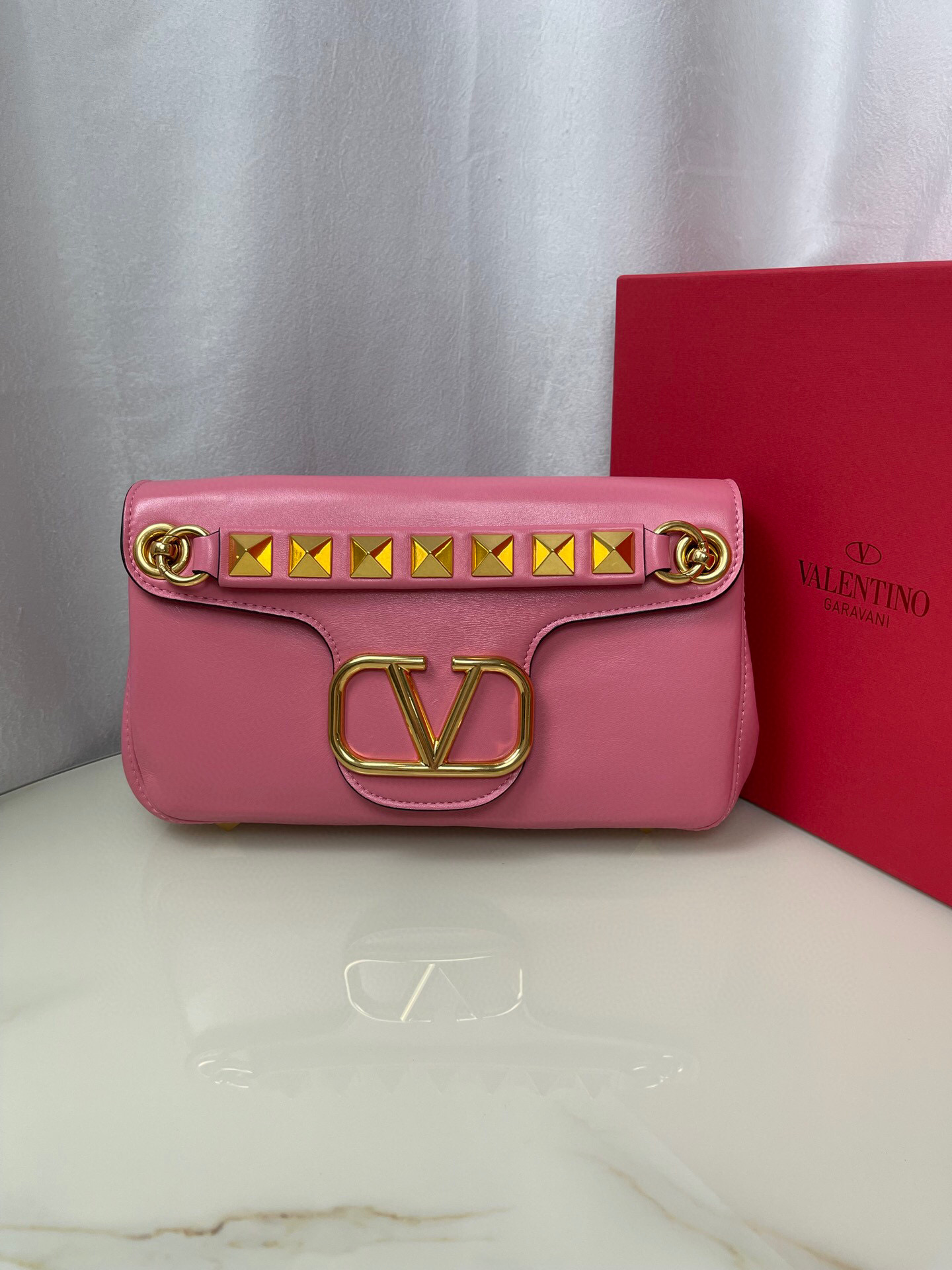 Valentino Stud Sign
