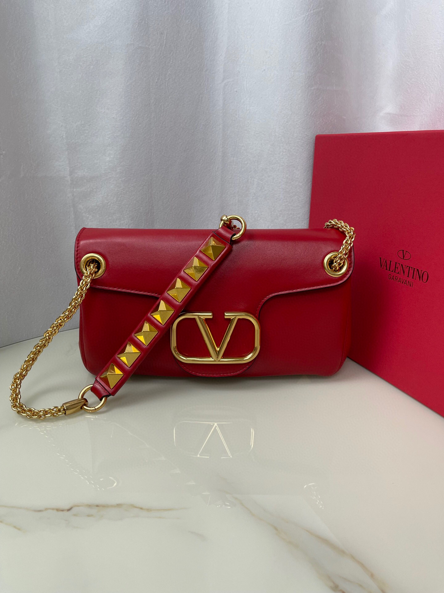 Valentino Stud Sign