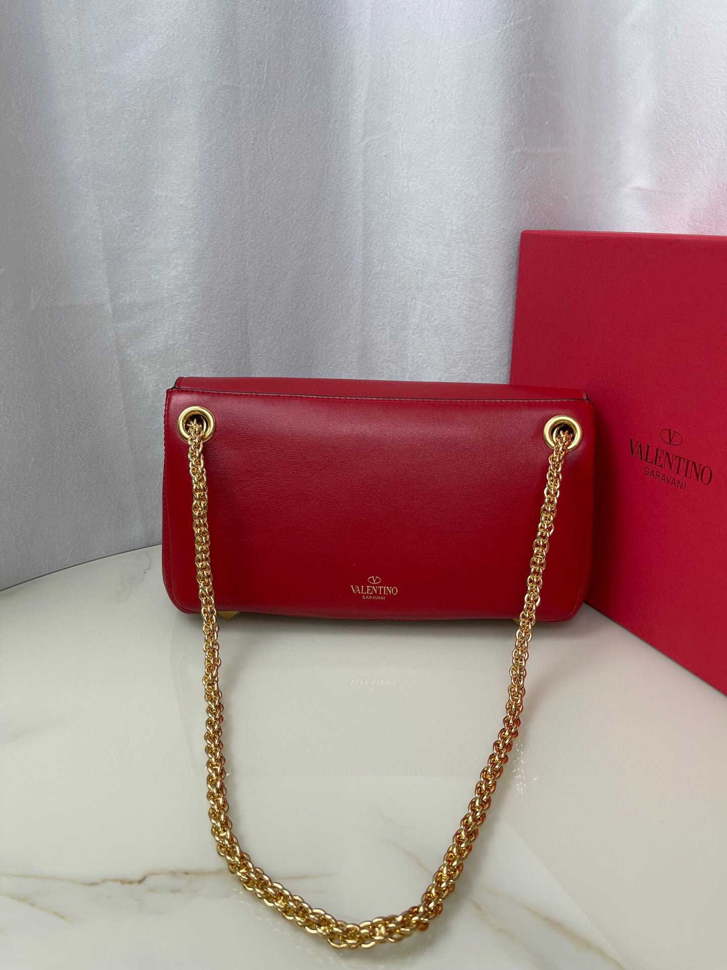 Valentino Stud Sign