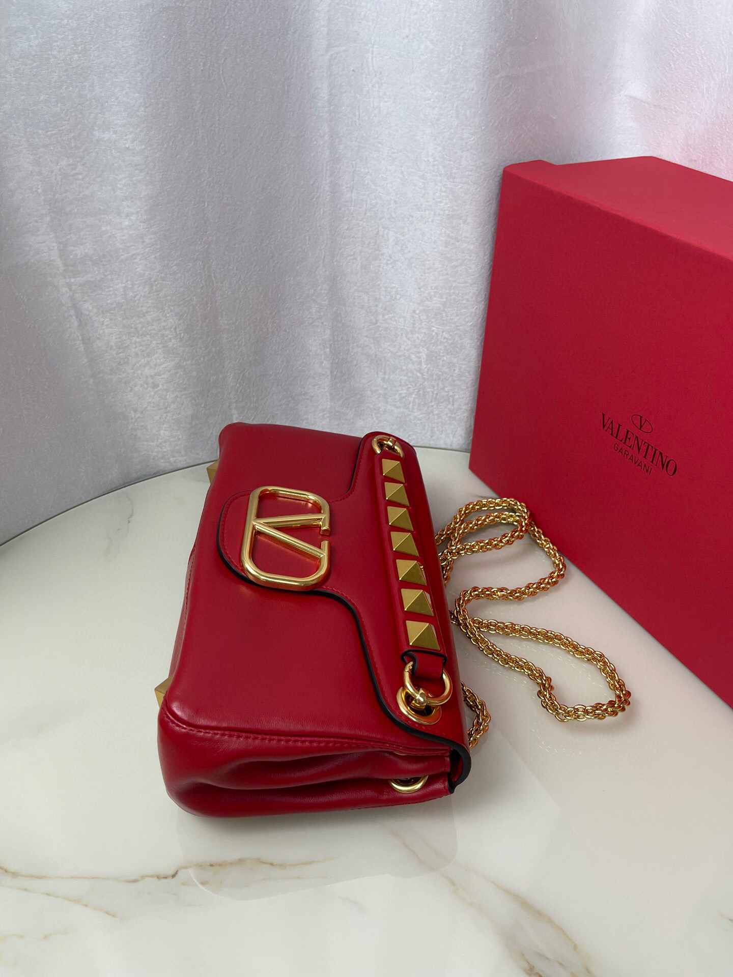 Valentino Stud Sign