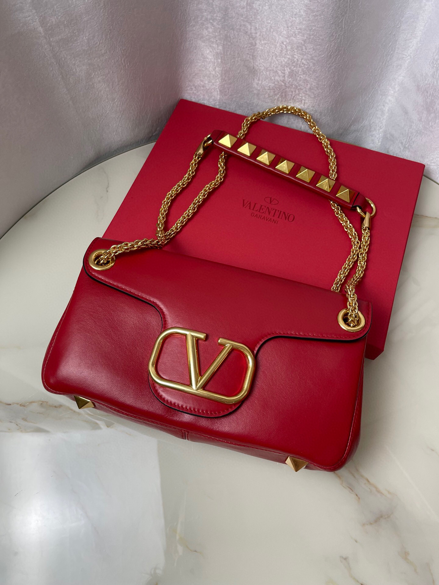 Valentino Stud Sign