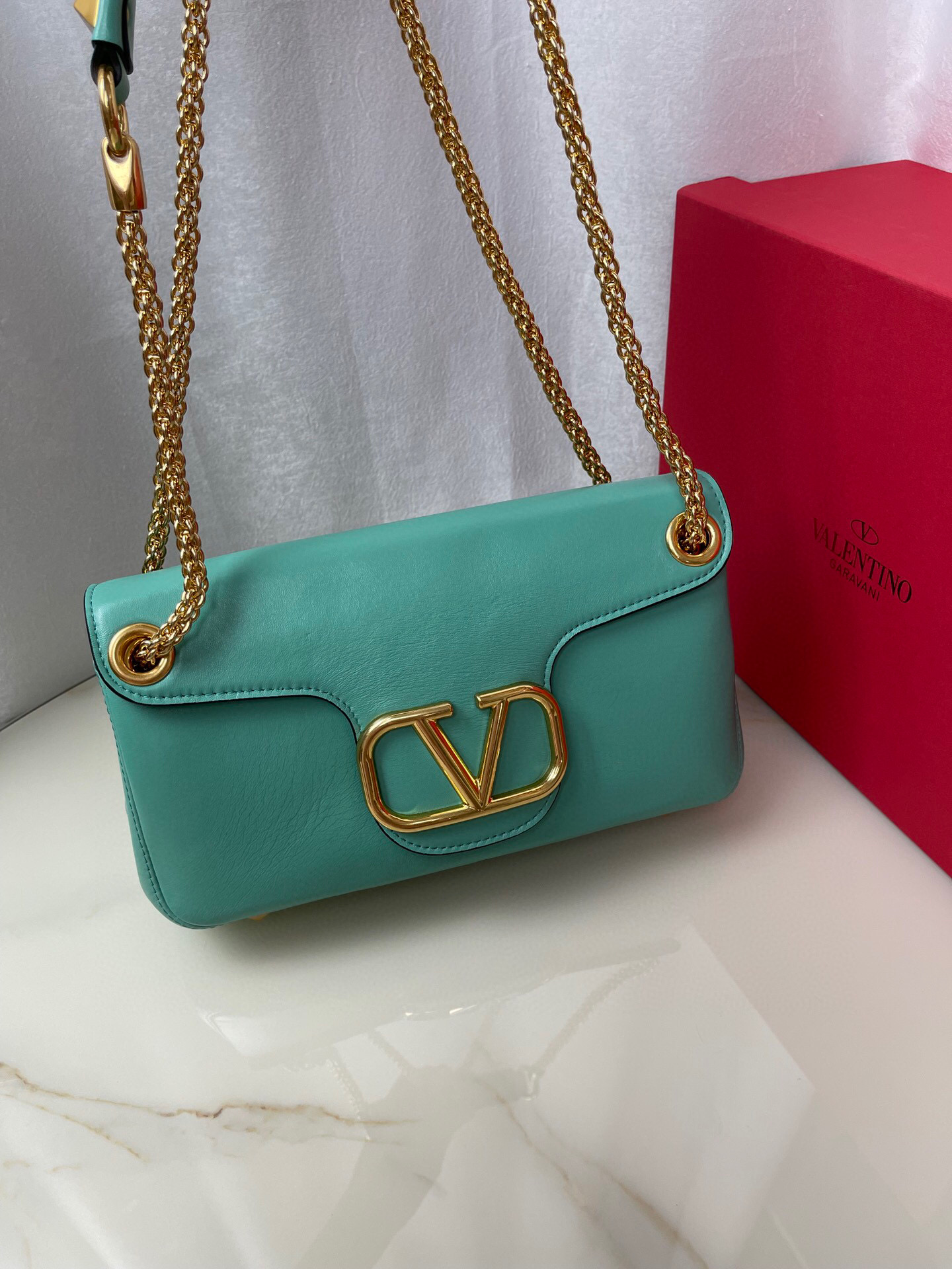 Valentino Stud Sign