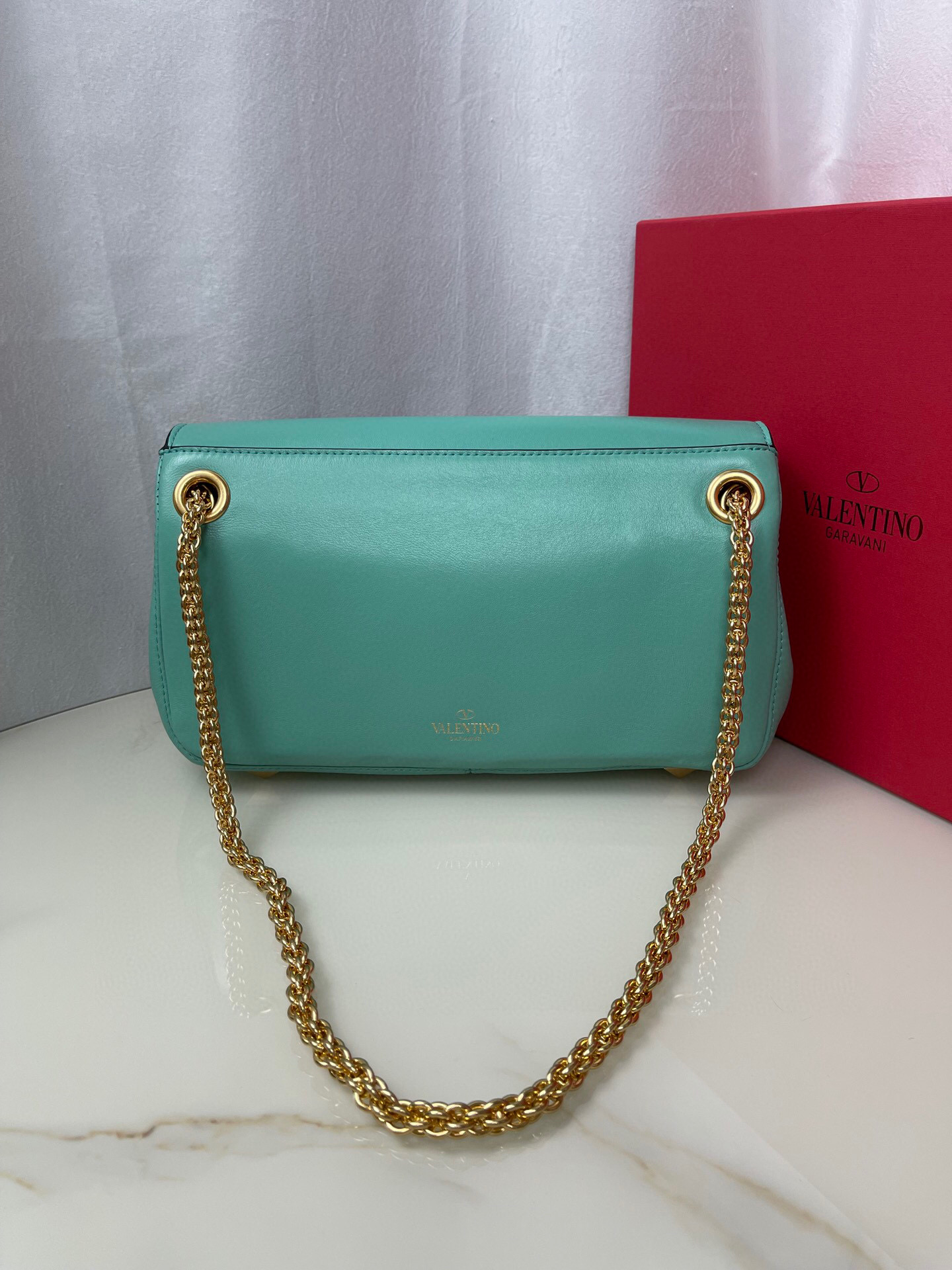 Valentino Stud Sign