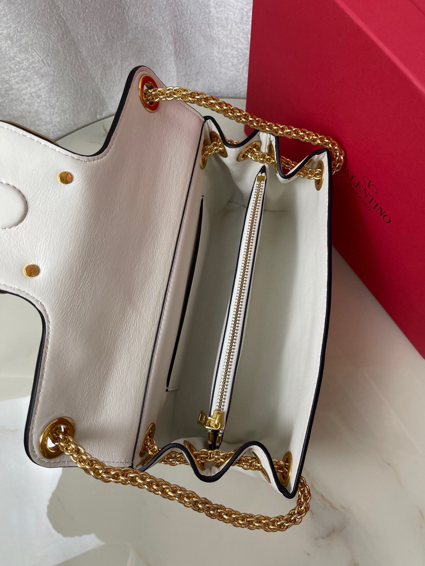 Valentino Stud Sign
