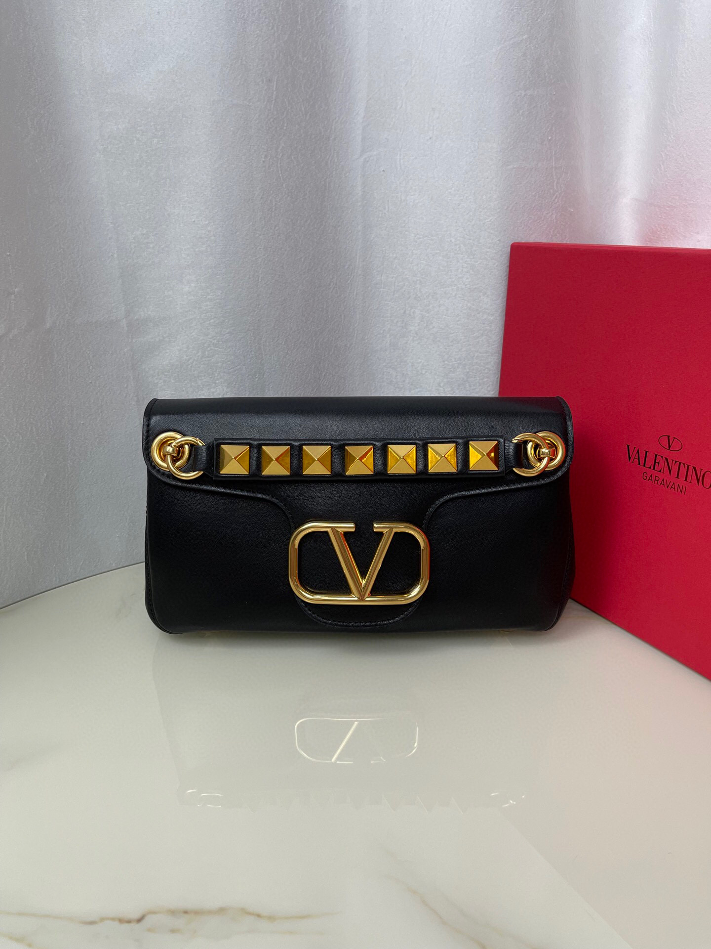 Valentino Stud Sign
