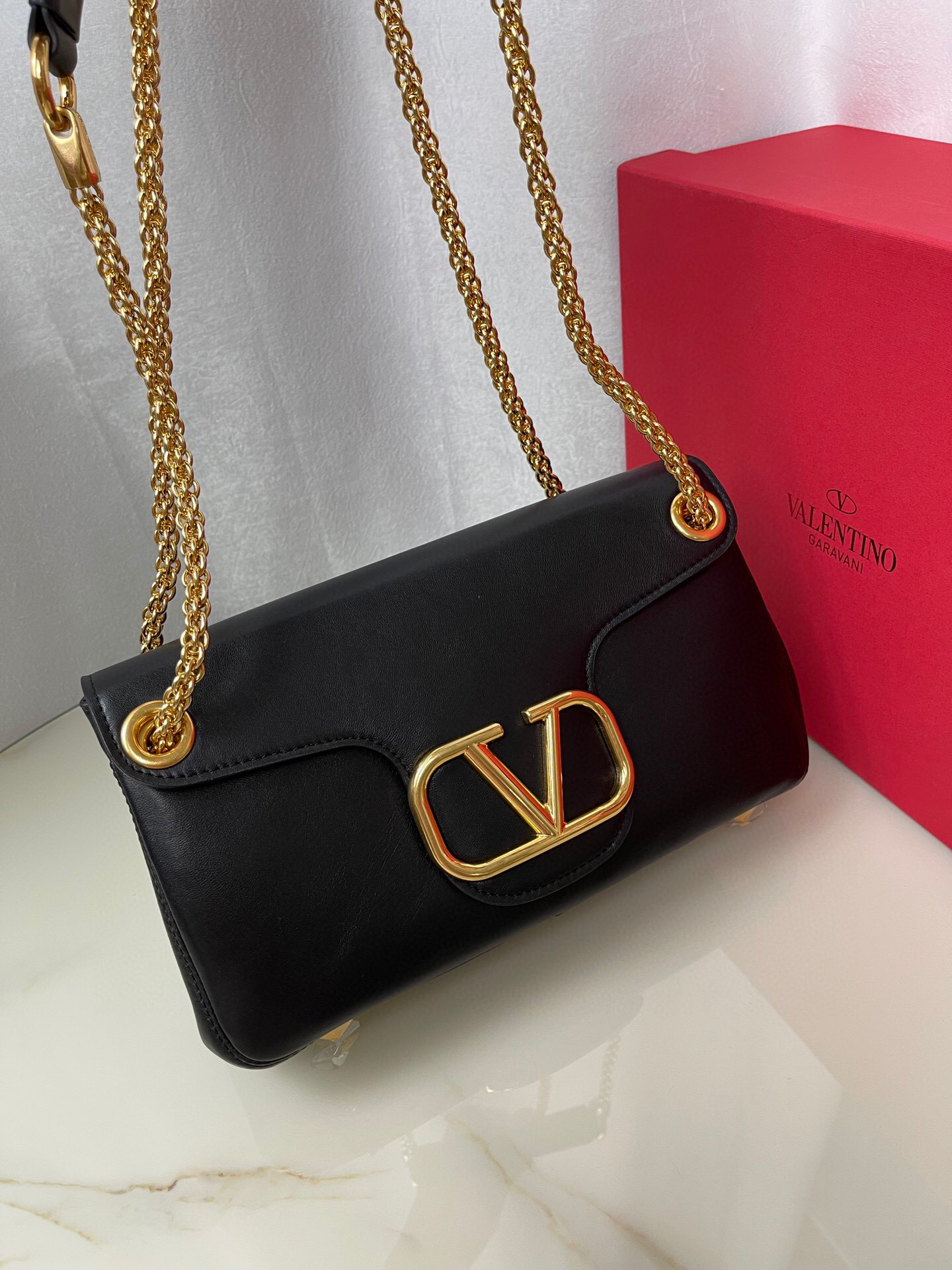 Valentino Stud Sign