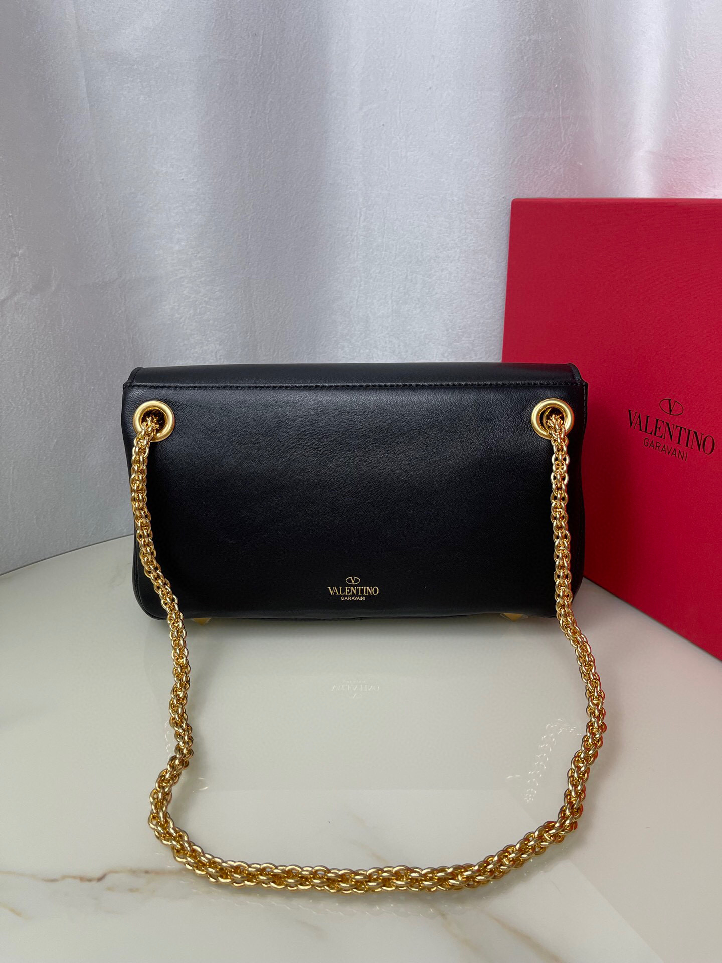 Valentino Stud Sign