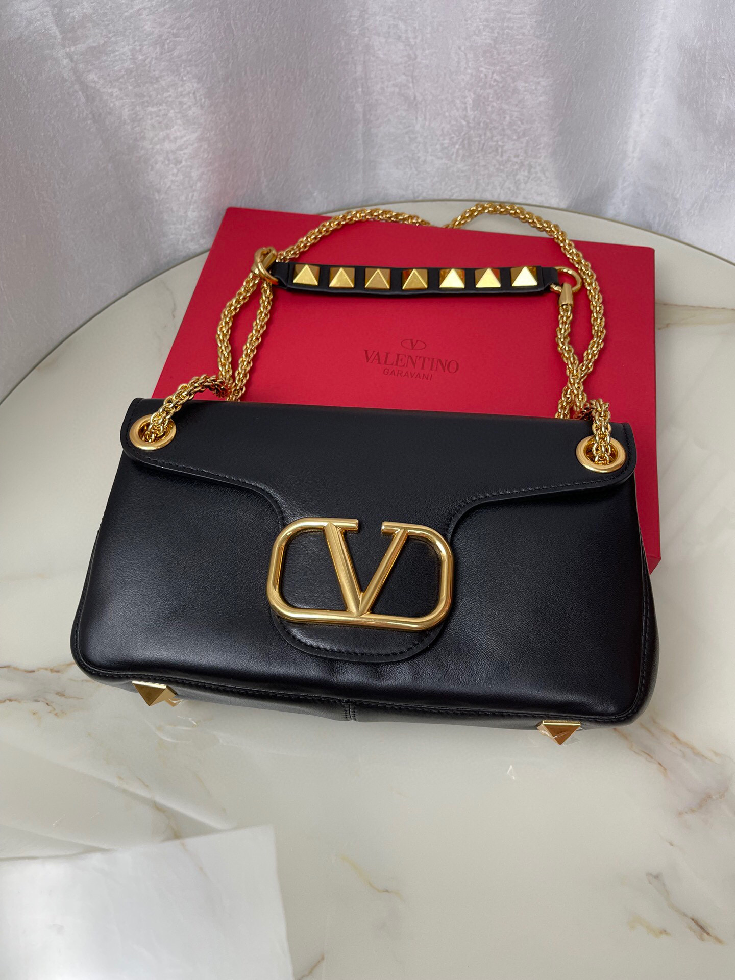 Valentino Stud Sign