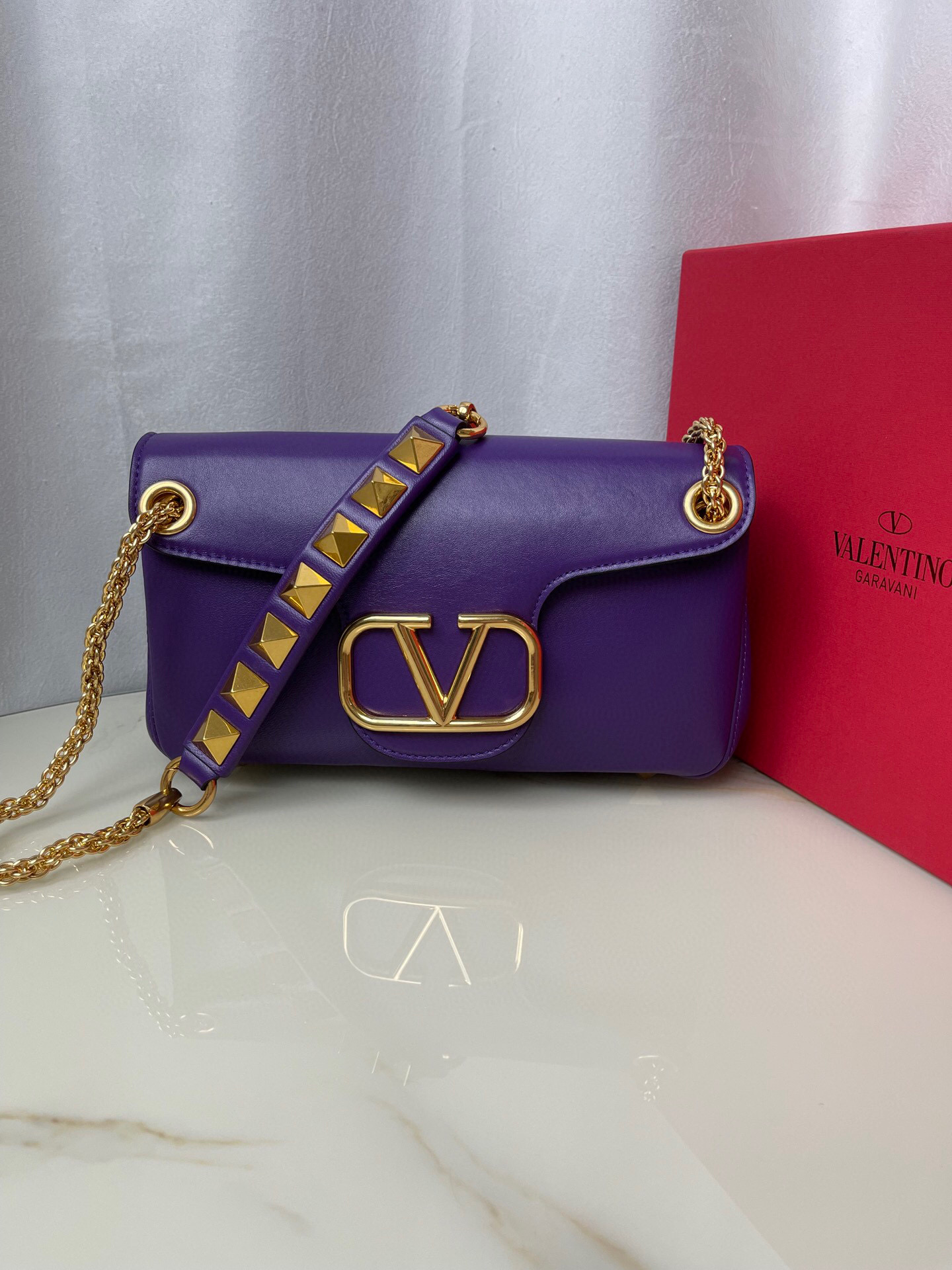 Valentino Stud Sign