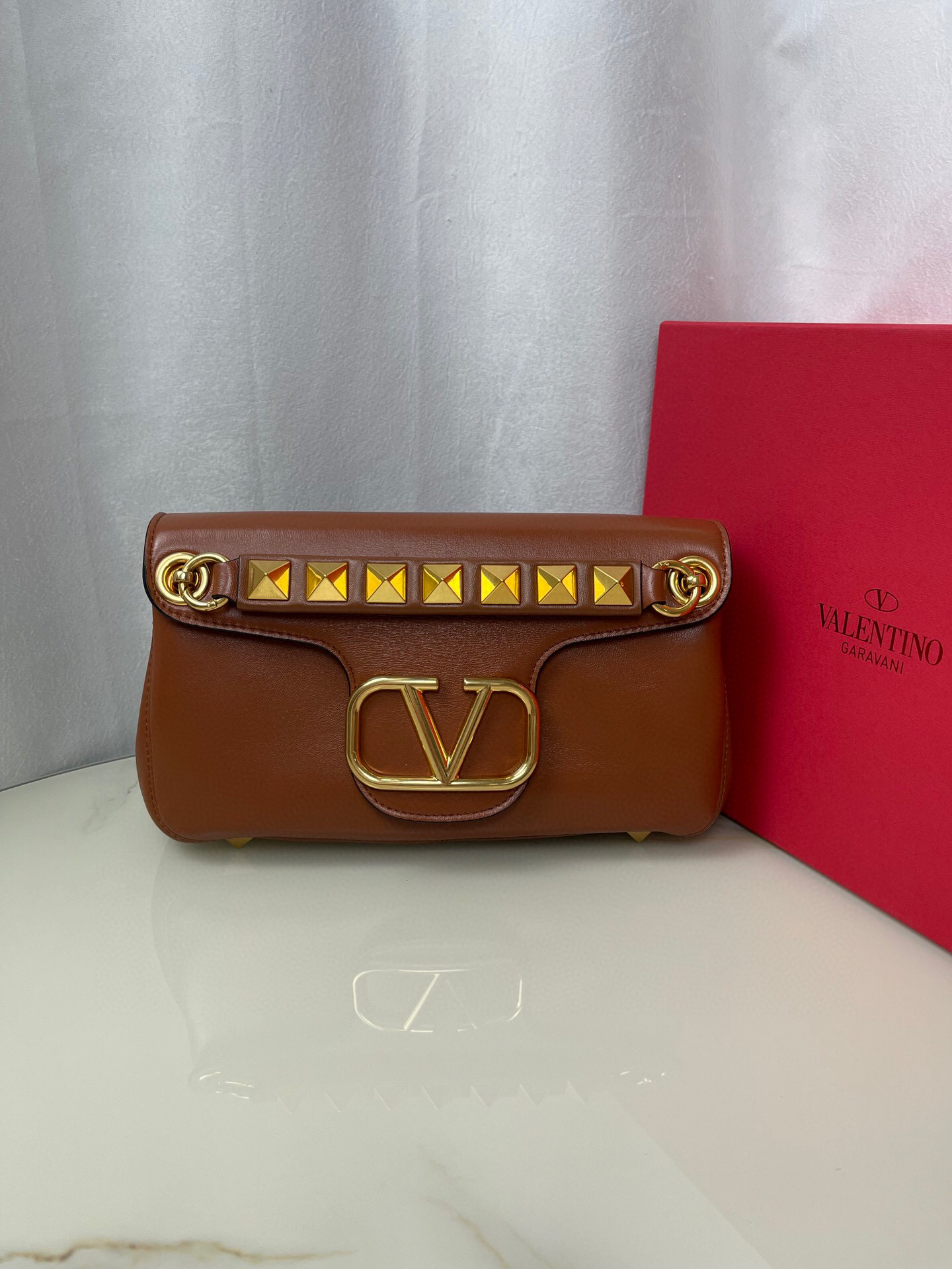 Valentino Stud Sign
