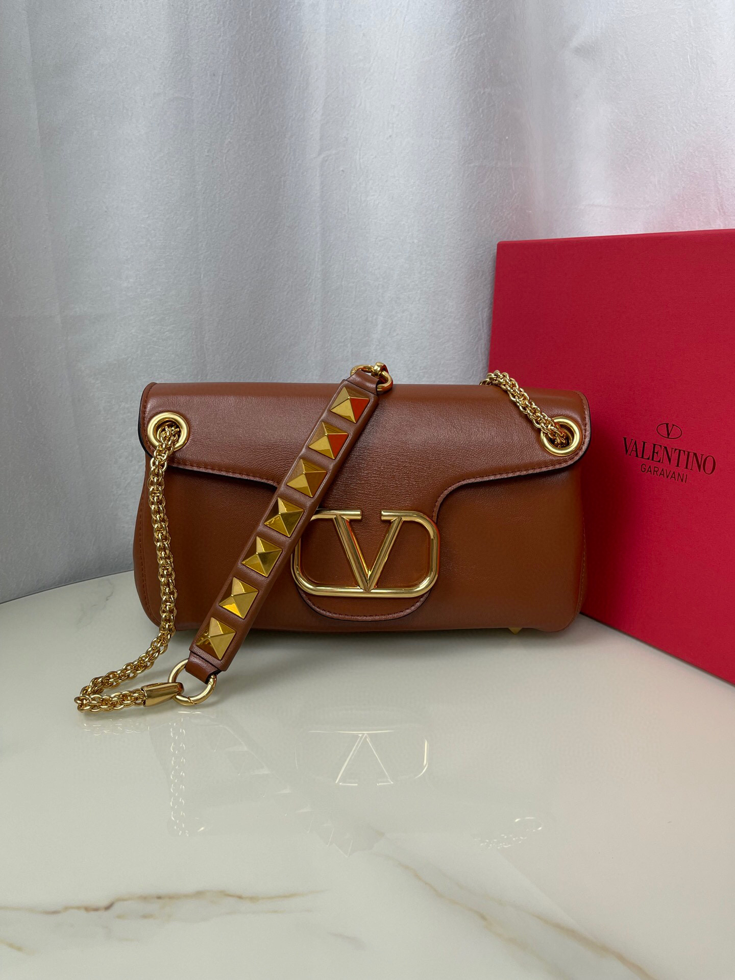 Valentino Stud Sign