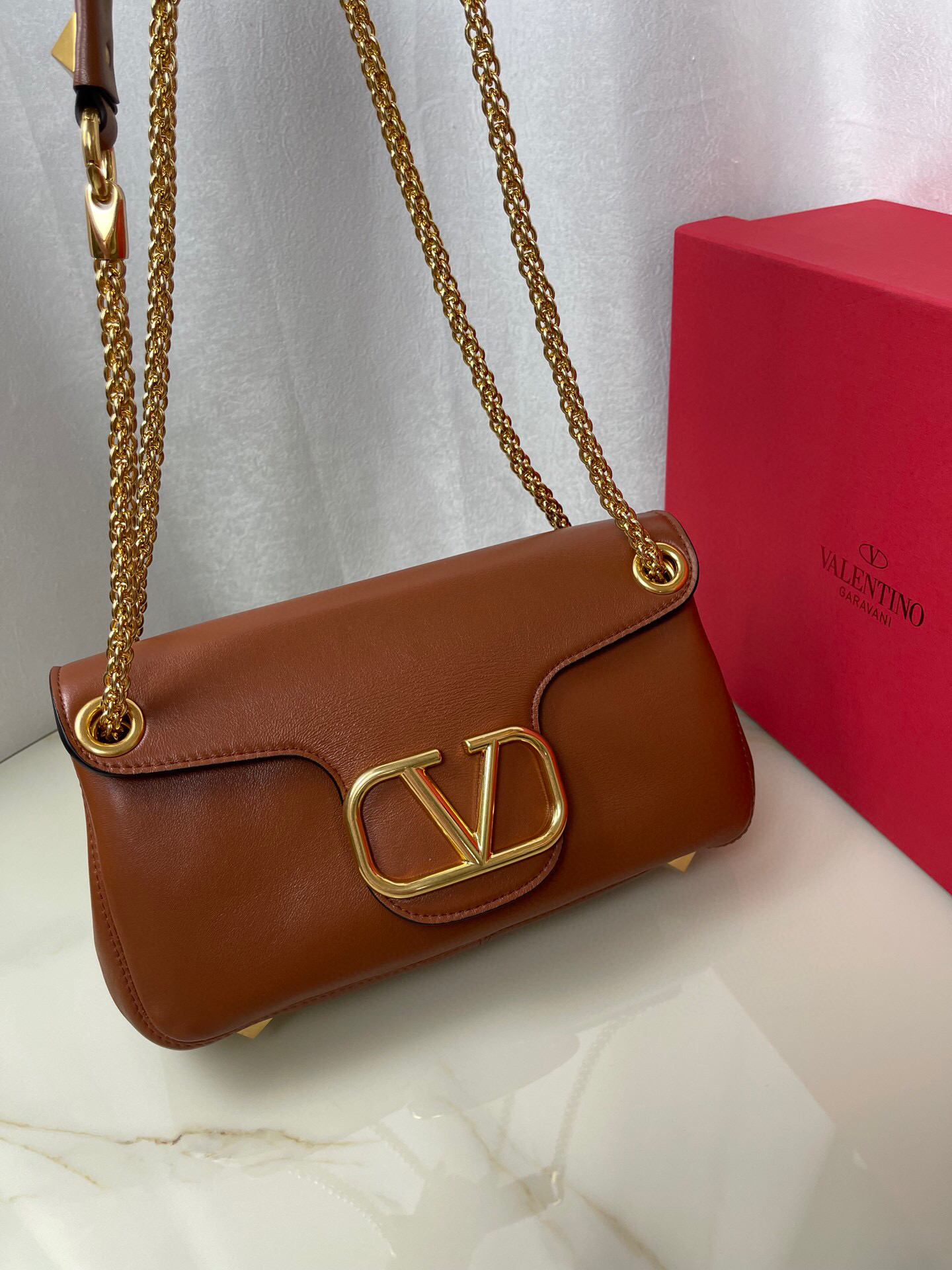 Valentino Stud Sign