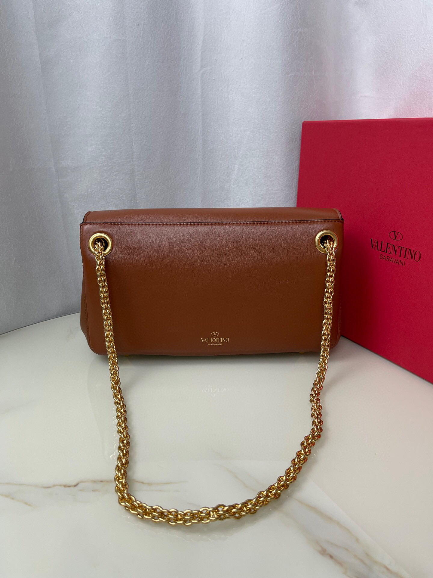 Valentino Stud Sign