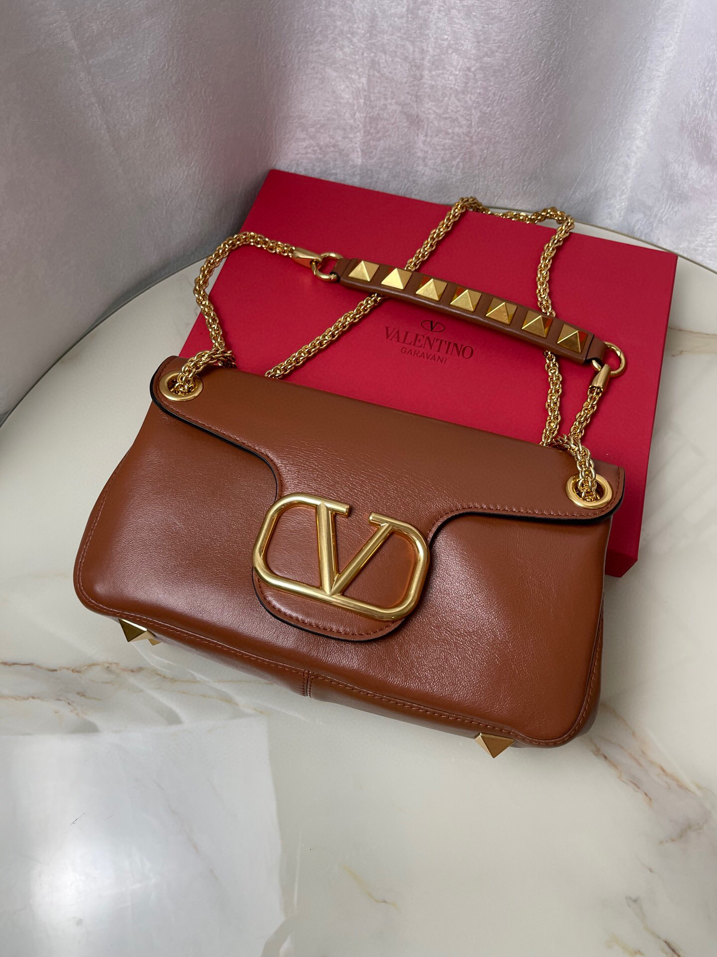 Valentino Stud Sign