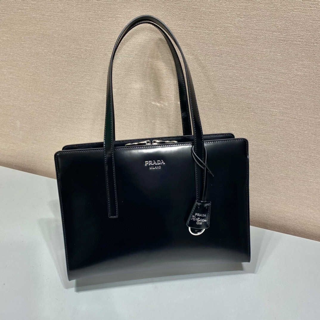 Pra*a re-edition 1995 brushed-leather medium handbag