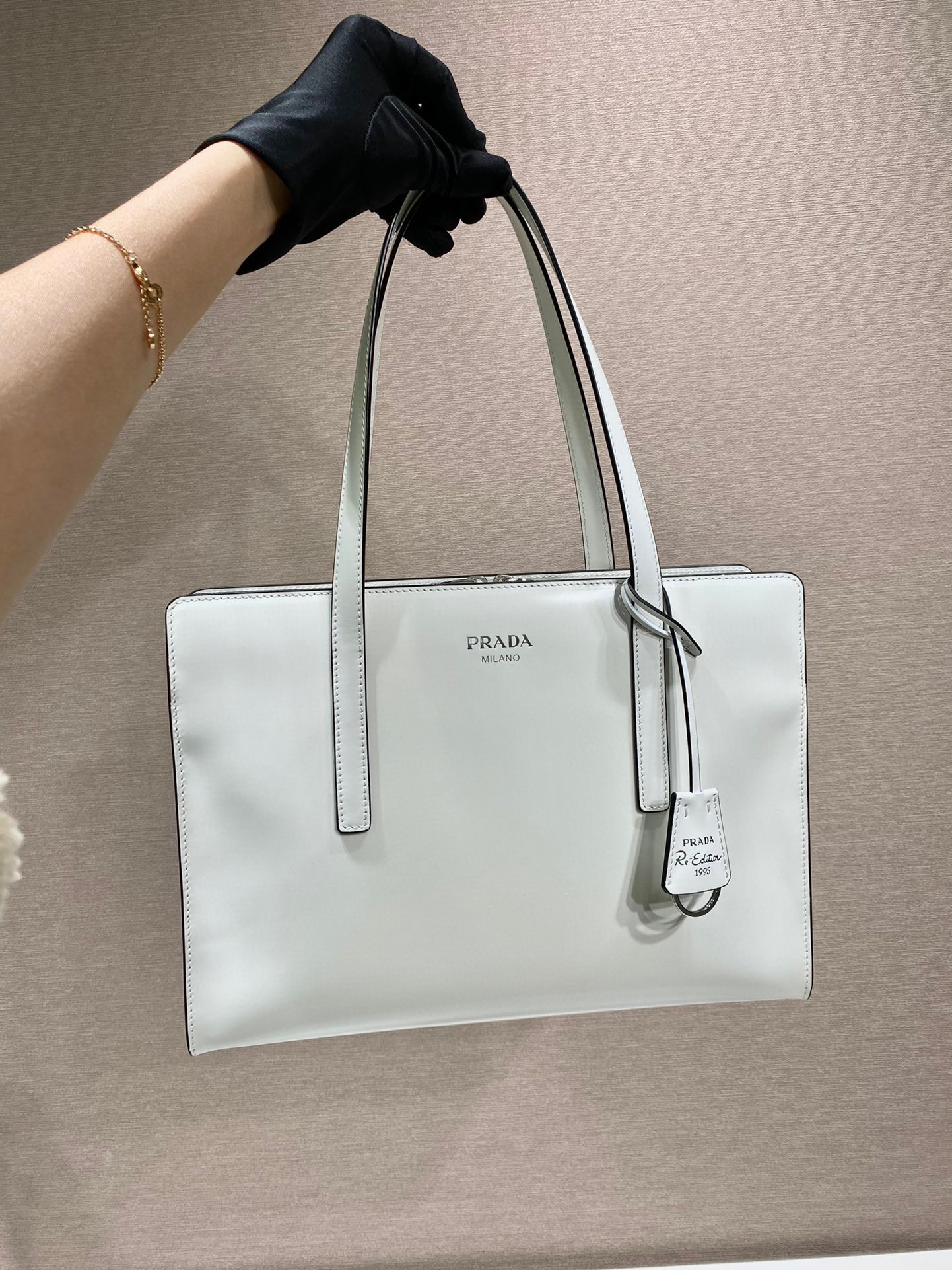 Pra*a re-edition 1995 brushed-leather medium handbag