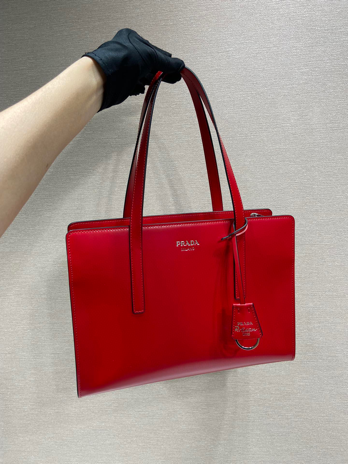Pra*a re-edition 1995 brushed-leather medium handbag