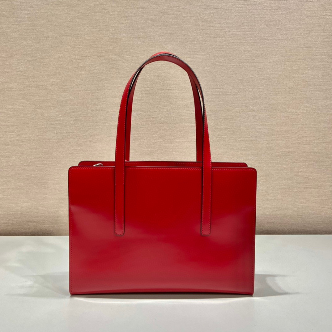 Pra*a re-edition 1995 brushed-leather medium handbag