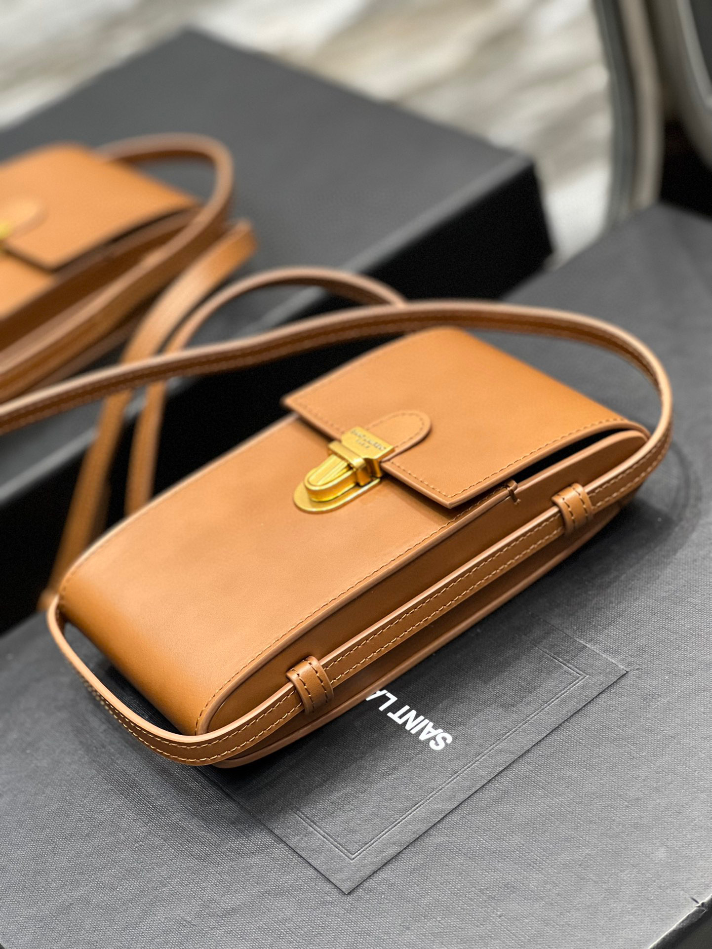YSL Phone Holder Tuc