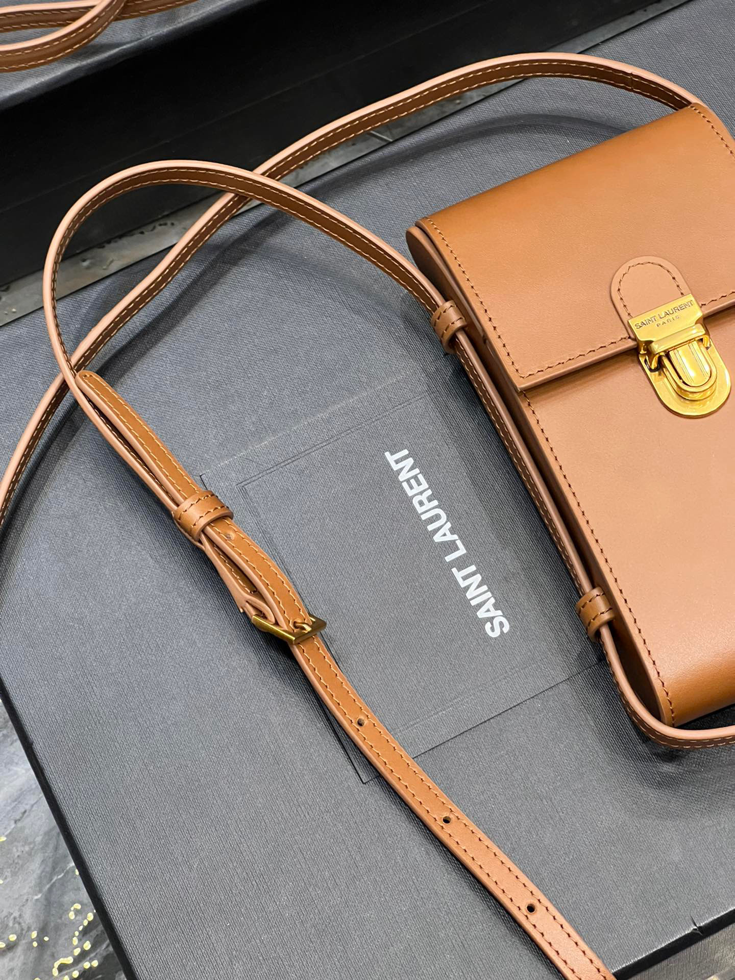 YSL Phone Holder Tuc