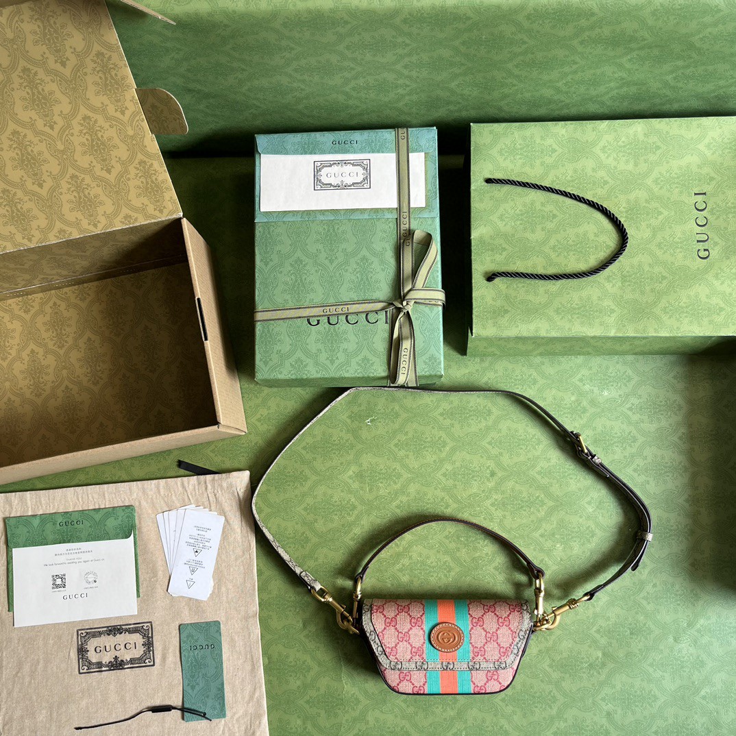 G*u*i gg top handle mini bag with web
