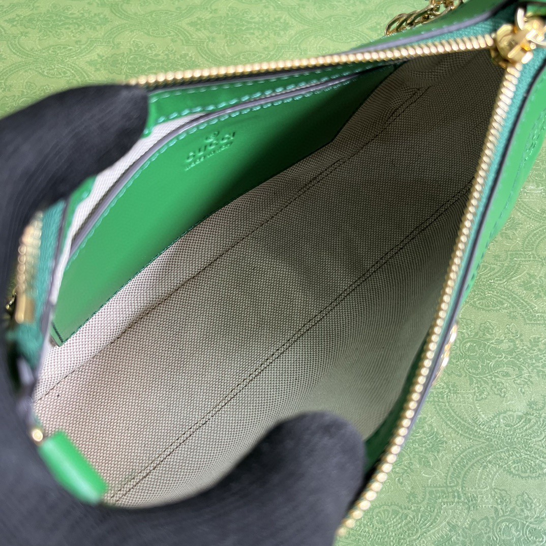 G*u*i matelassé handbag