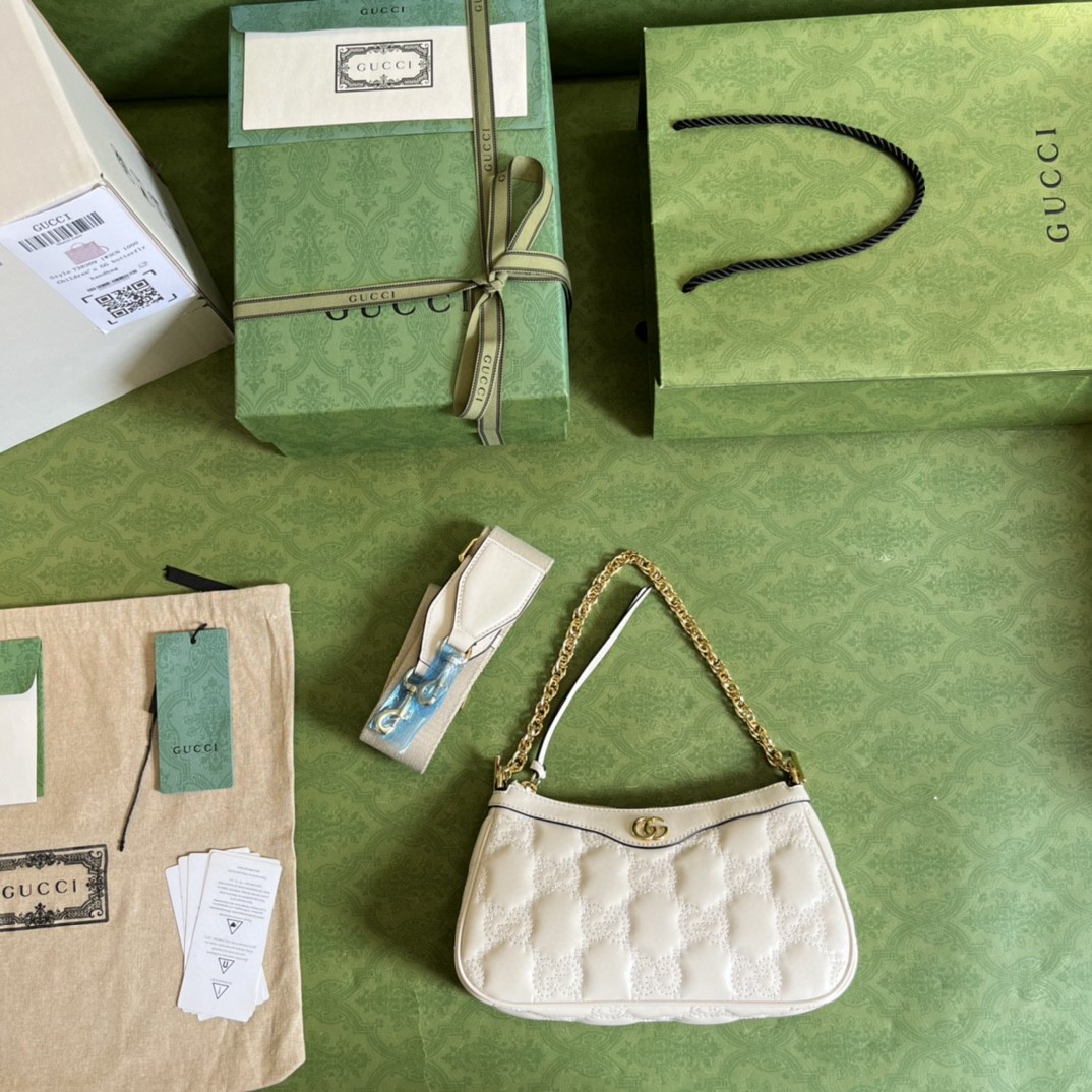 G*u*i matelassé handbag