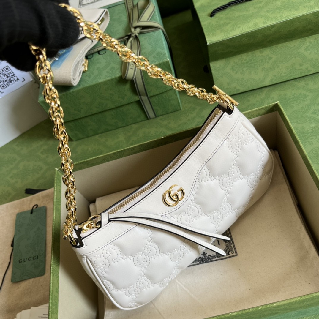 G*u*i matelassé handbag