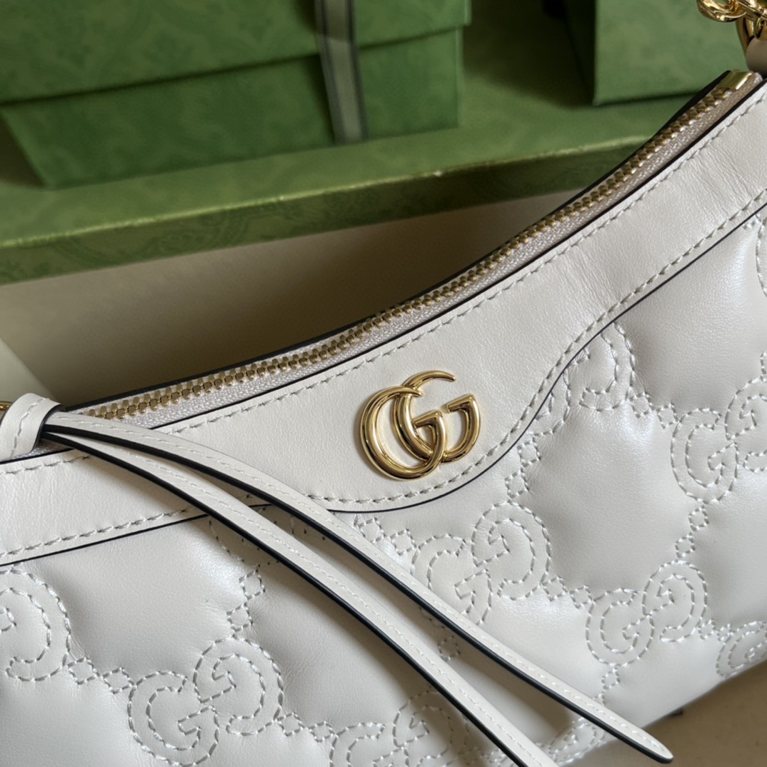 G*u*i matelassé handbag