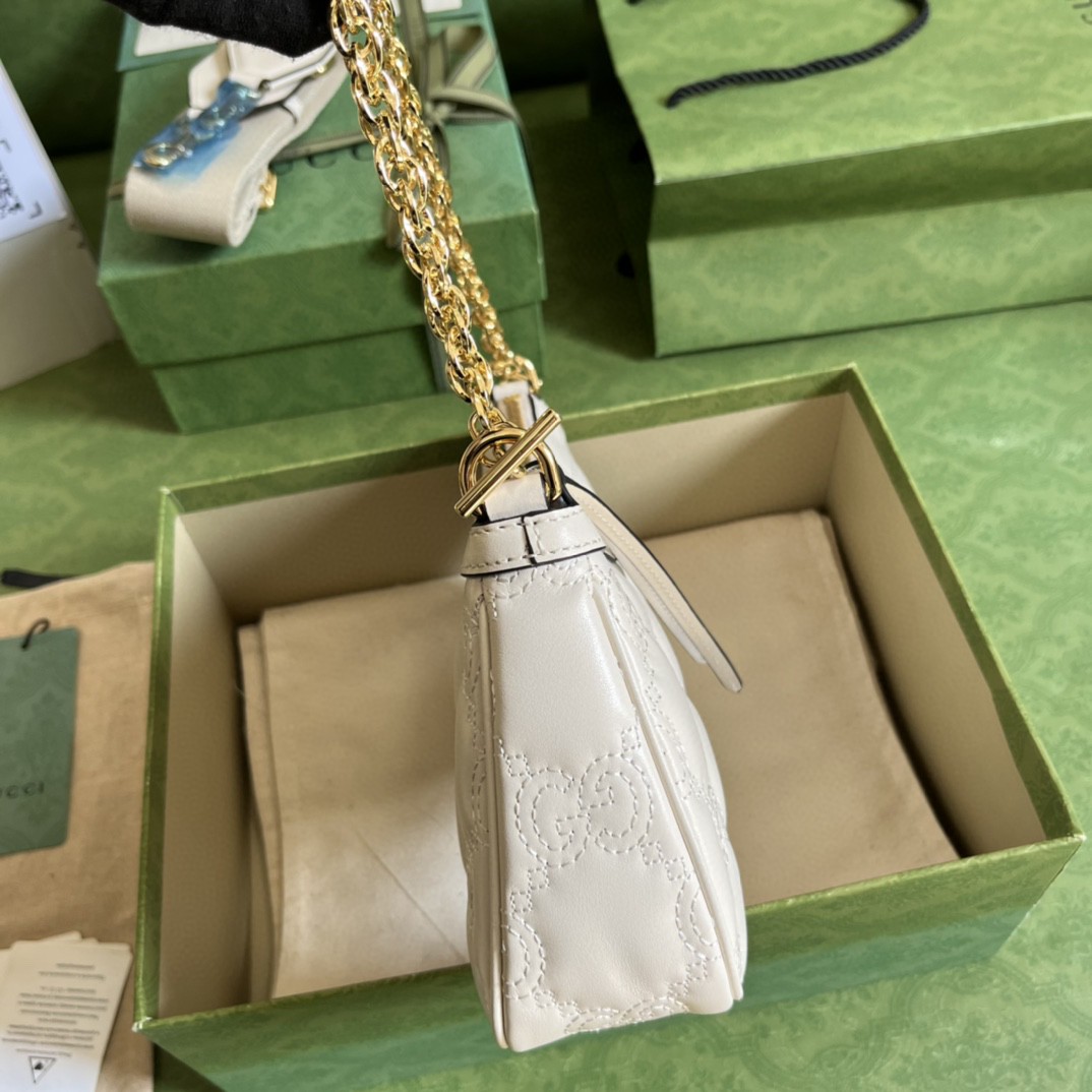 G*u*i matelassé handbag