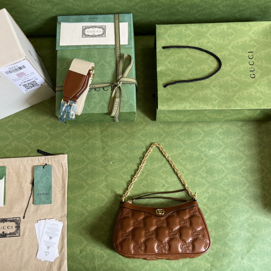 G*u*i matelassé handbag