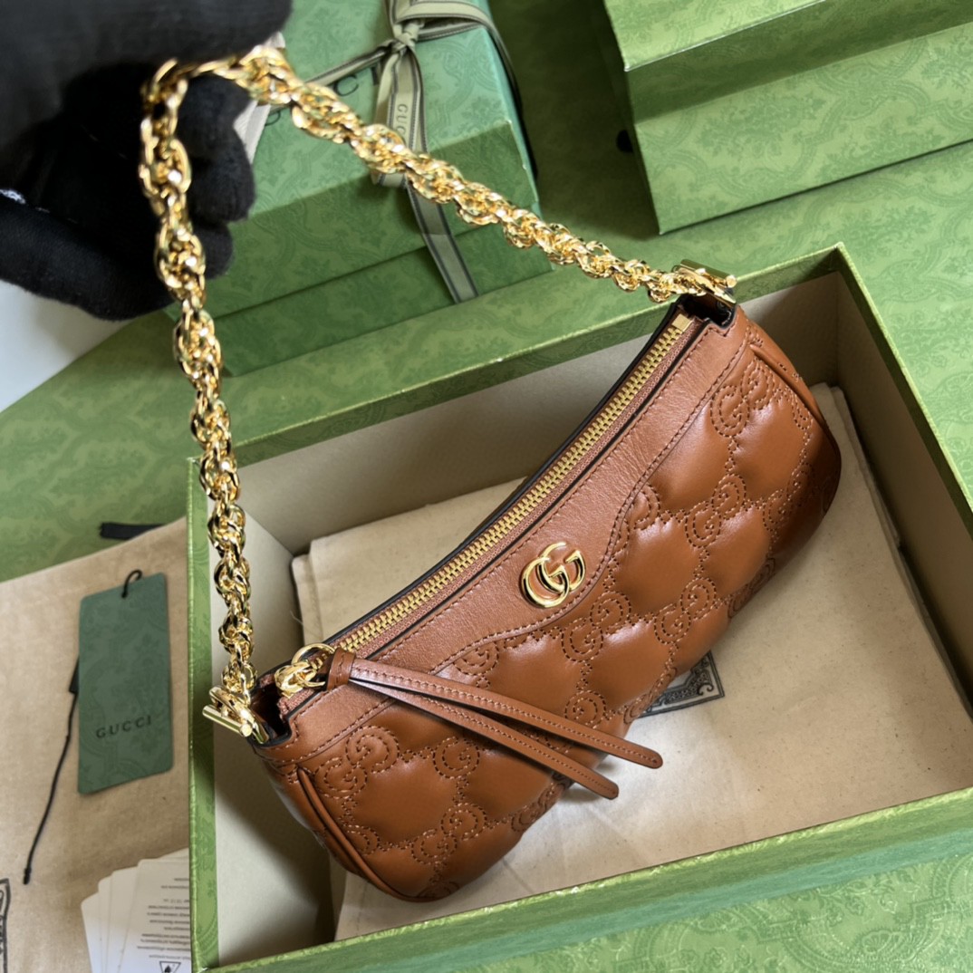 G*u*i matelassé handbag