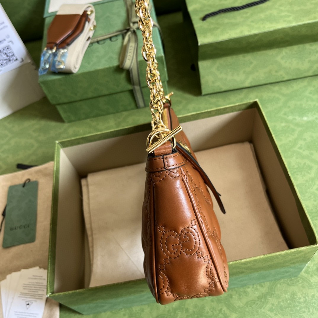 G*u*i matelassé handbag