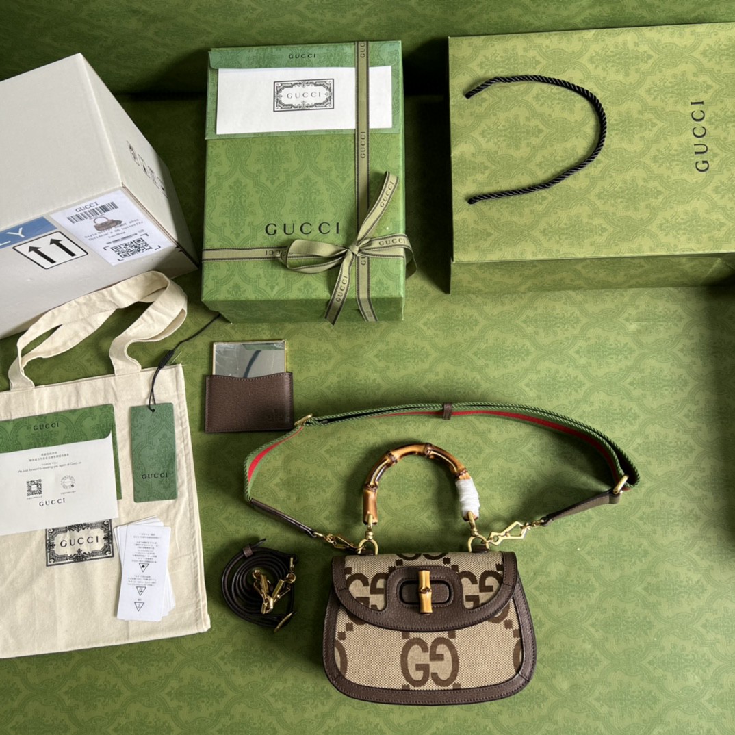 G*u*i bamboo handle bag