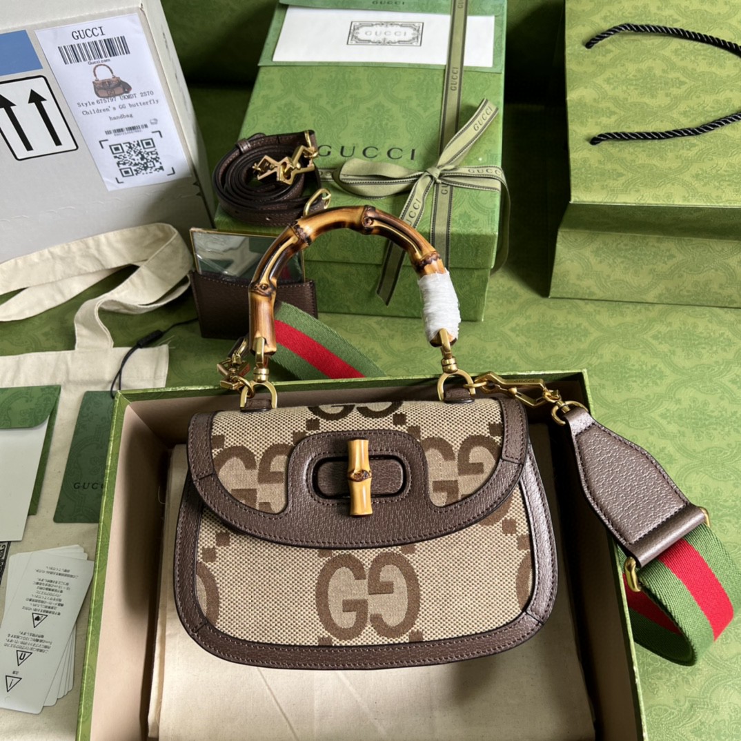 G*u*i bamboo handle bag