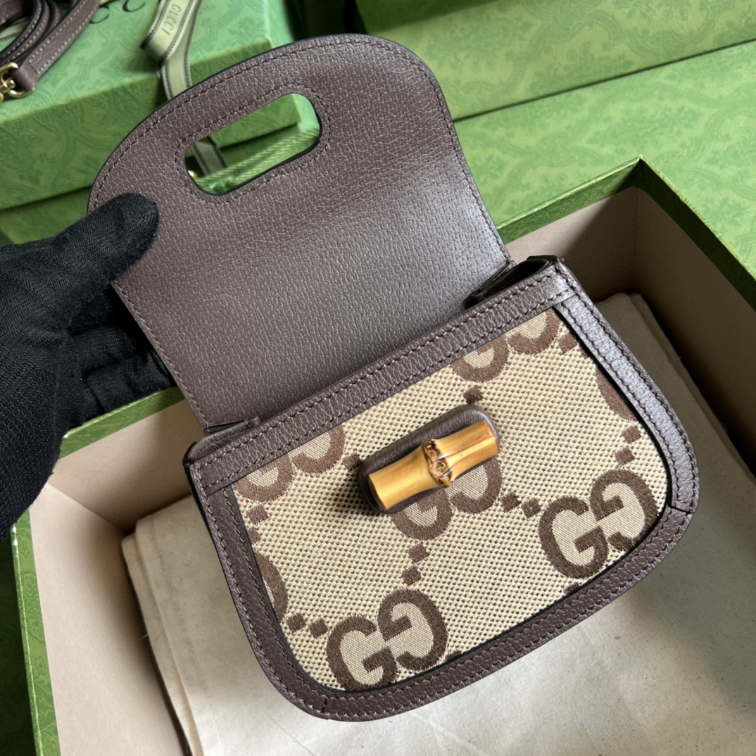 G*u*i bamboo handle bag