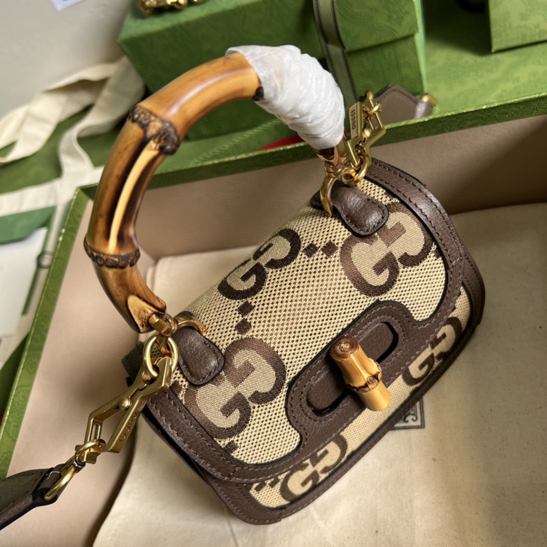 G*u*i bamboo handle bag