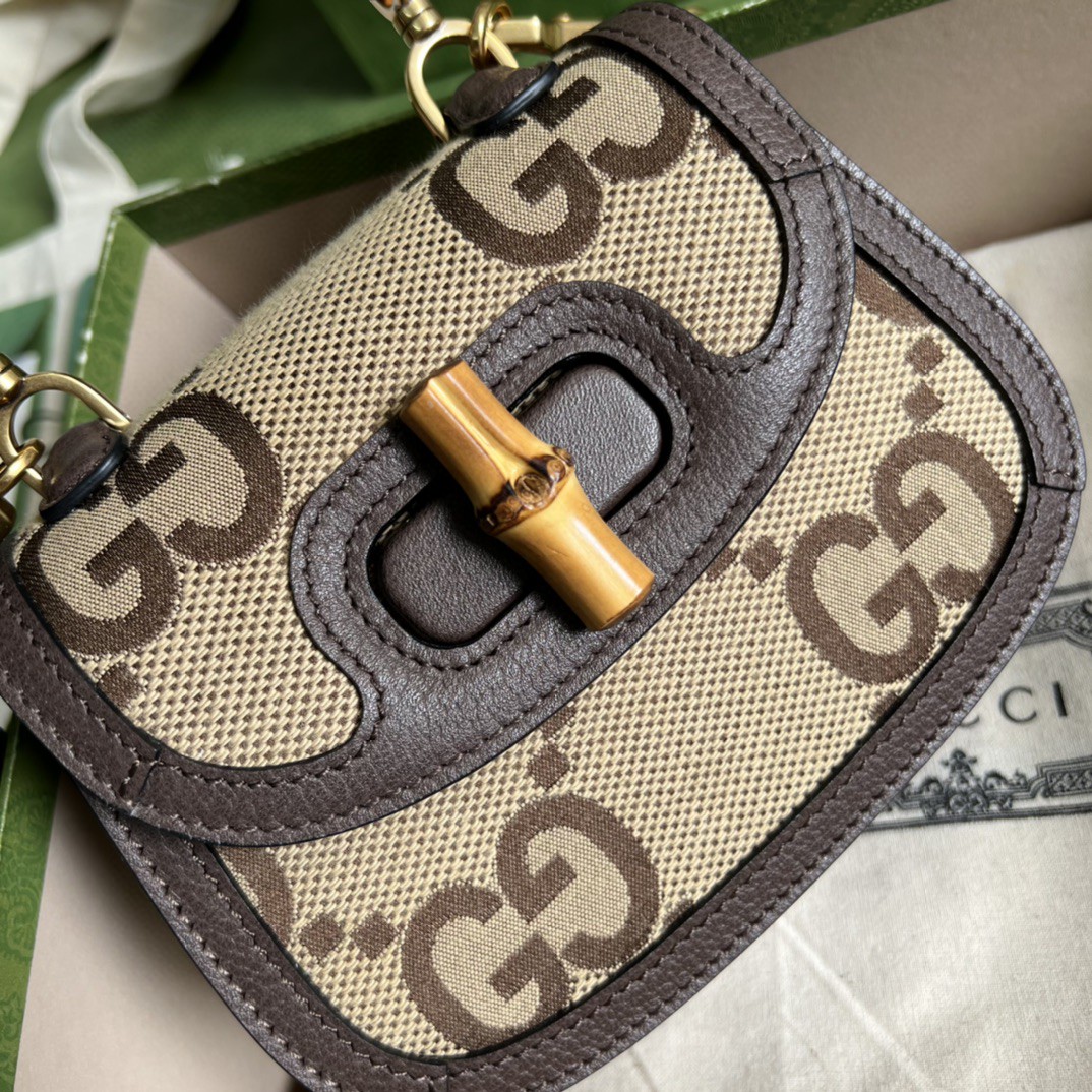 G*u*i bamboo handle bag