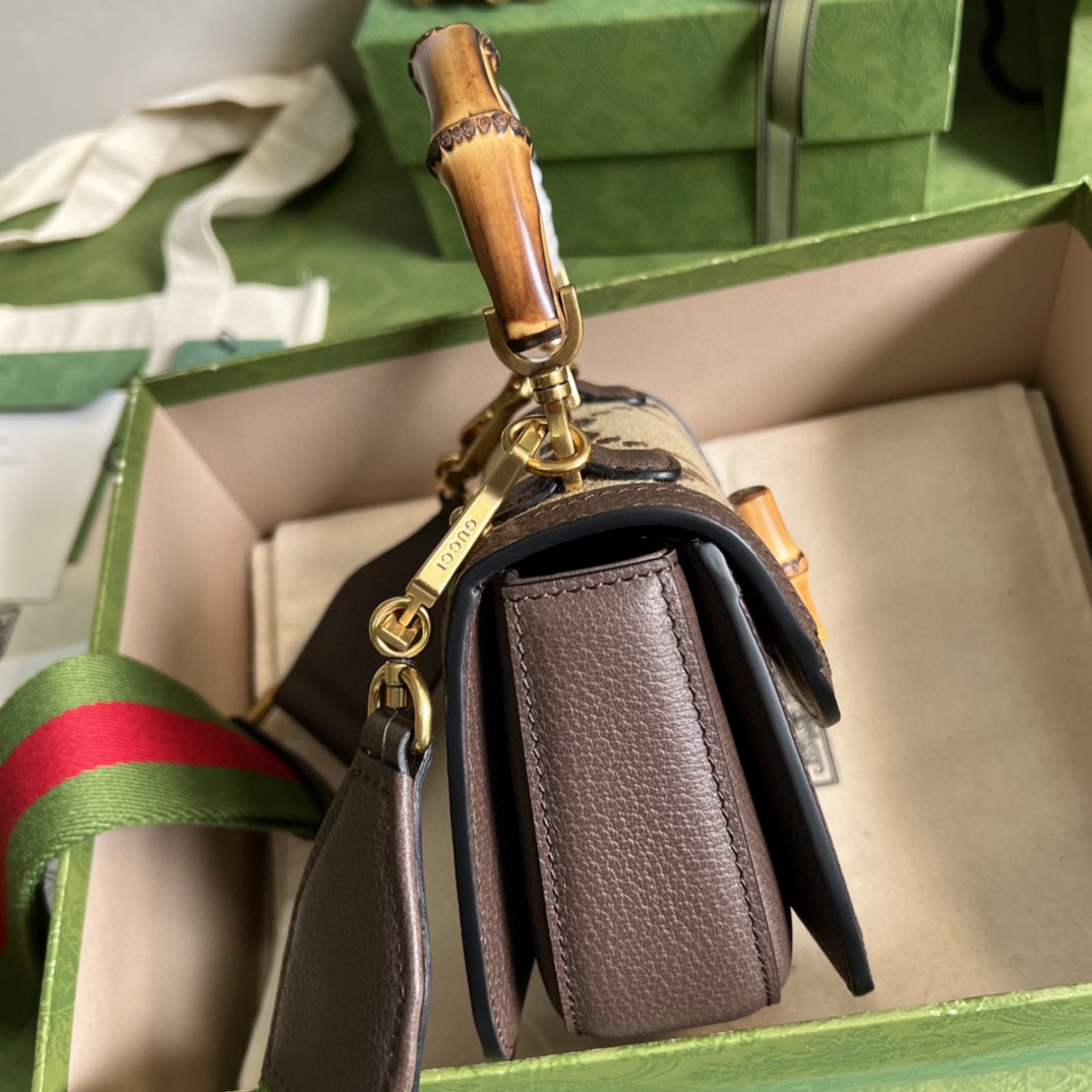 G*u*i bamboo handle bag