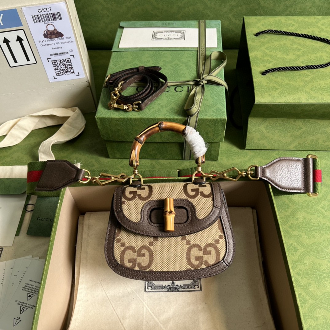 G*u*i bamboo handle bag